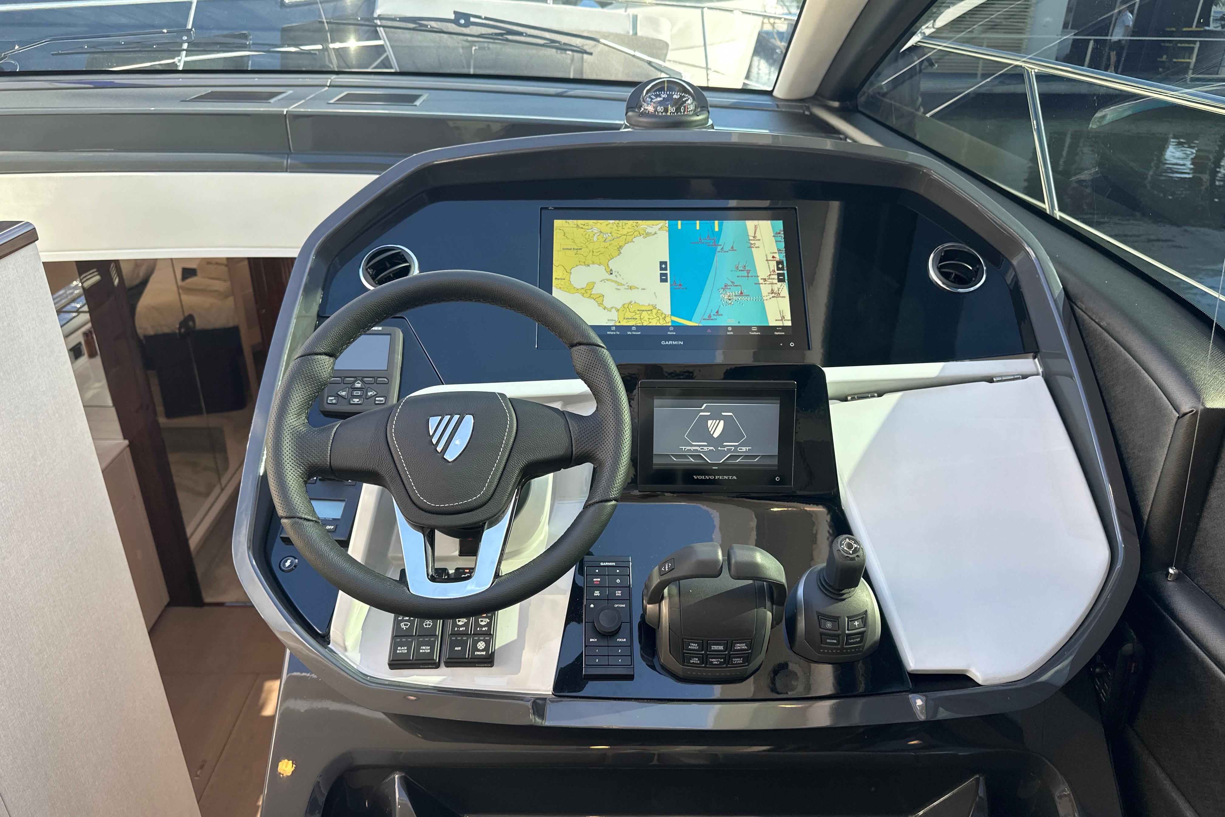 2026 Fairline Targa 47 GT helm with navigation display and controls.
