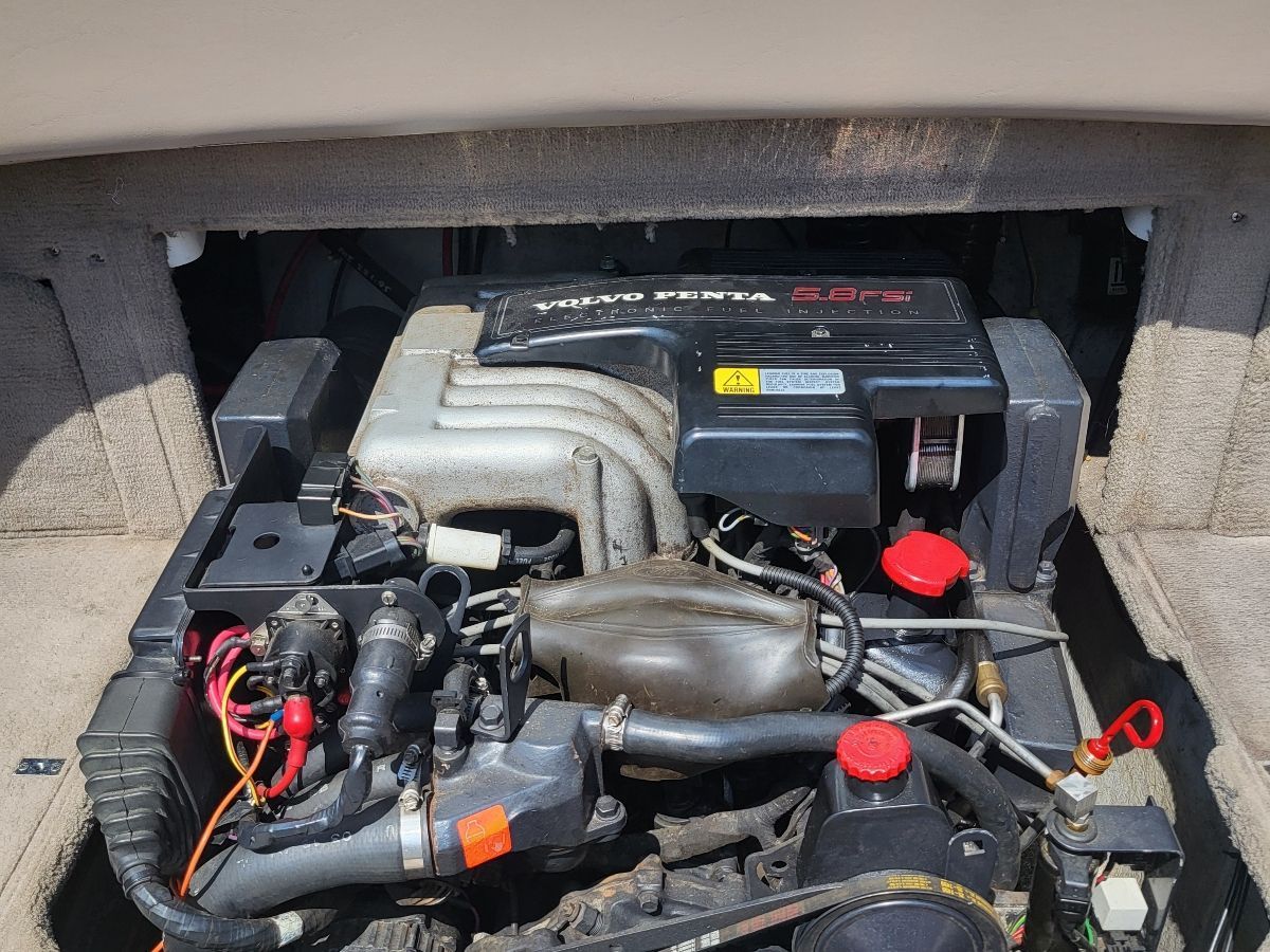 A Volvo Penta 5.8PS engine in a boat's engine compartment.