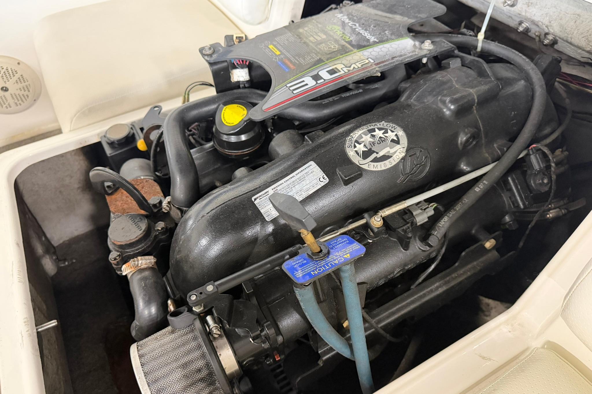 Engine of 2012 Bayliner 175 Bowrider, showcasing 3.0 MPI motor components.