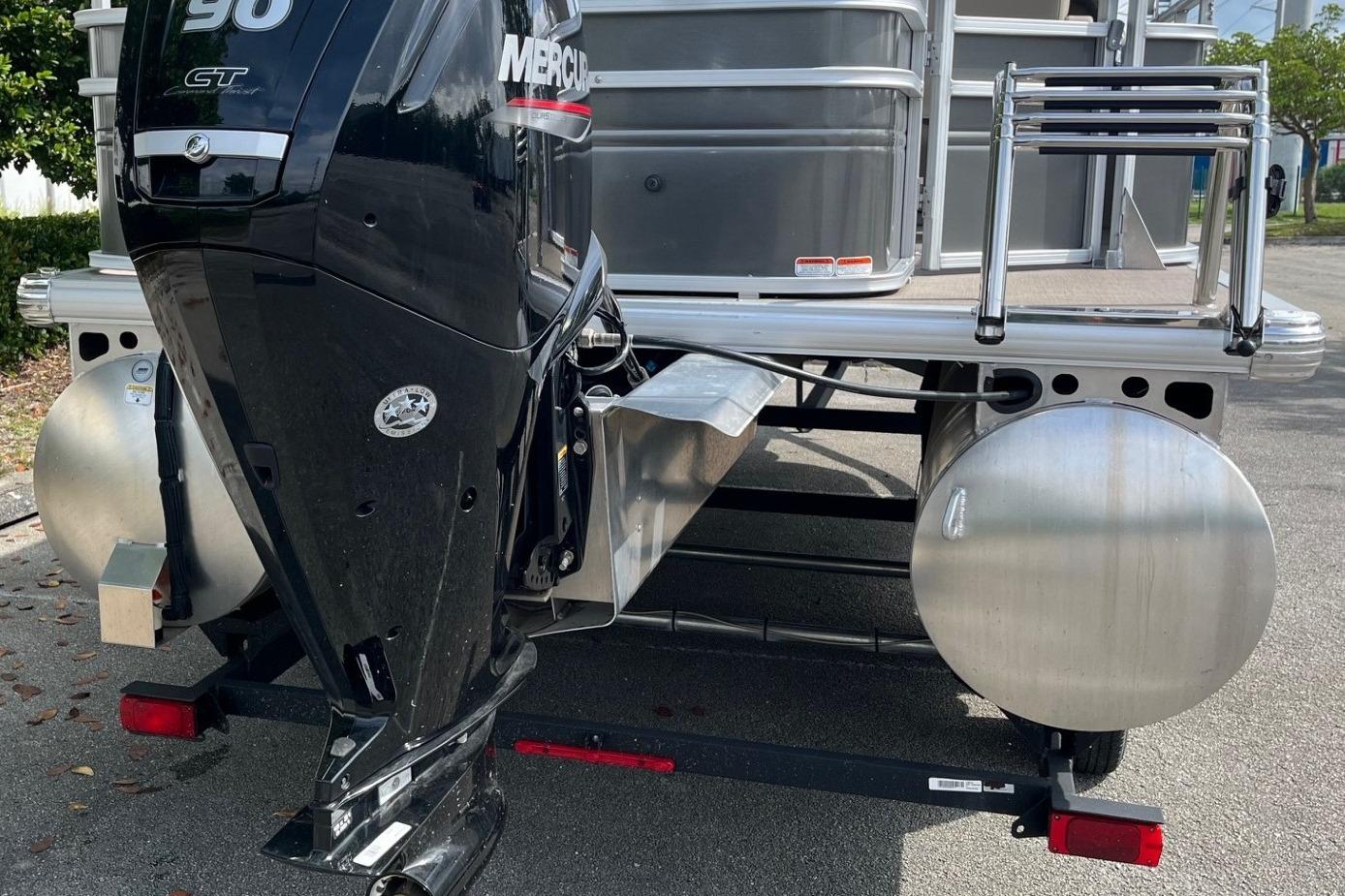 2025 Sun Tracker Fishin' Barge 20 DLX with Mercury 90 outboard motor.