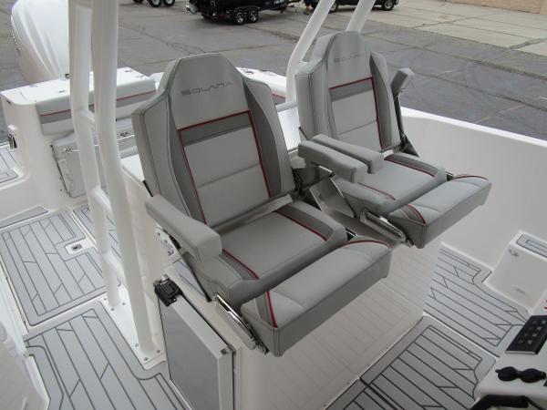 2025 Solara S-250 CW boat seats, featuring sleek gray design with red accents.