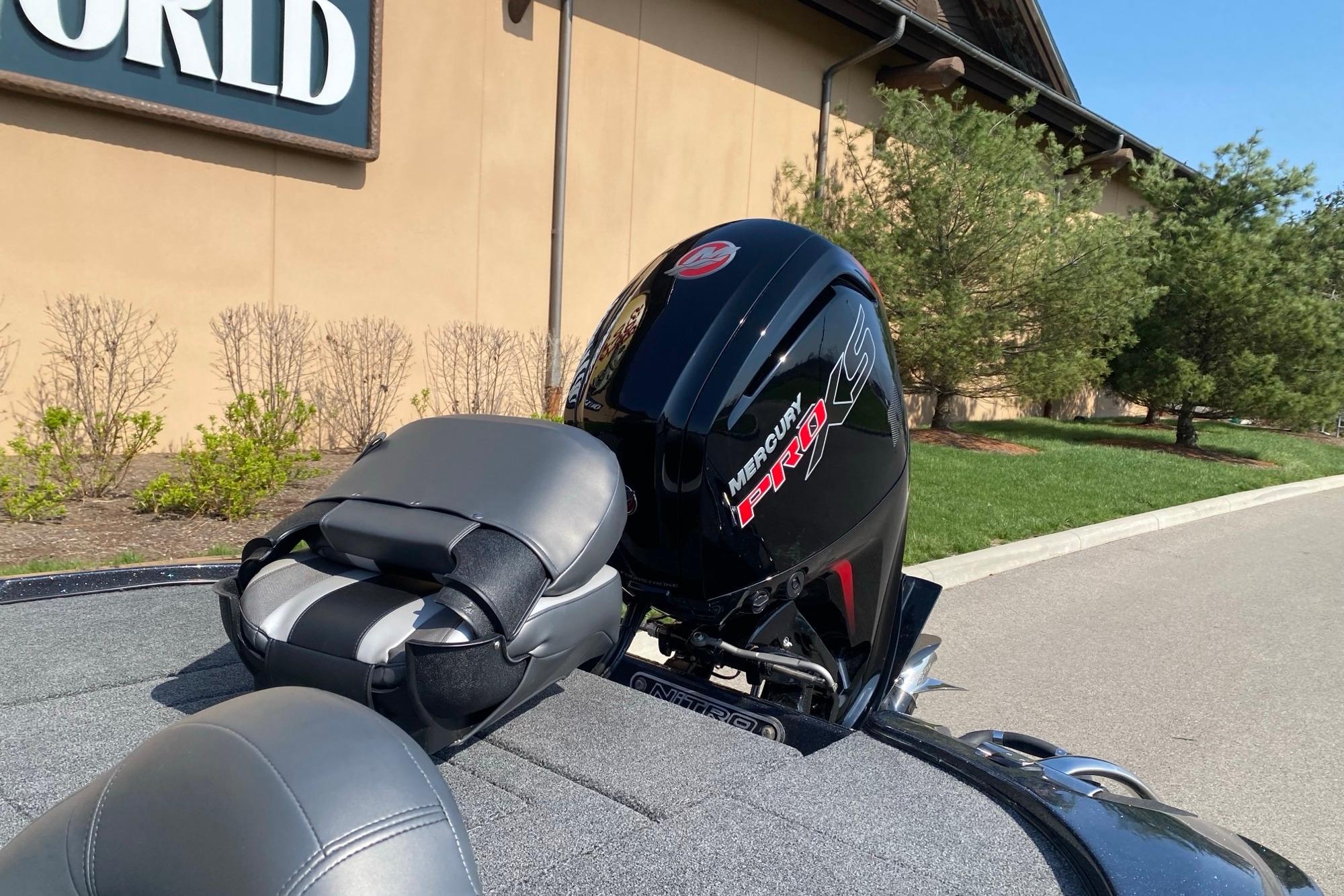 2026 Nitro Z17 boat with Mercury Pro XS engine, parked outdoors near a building.