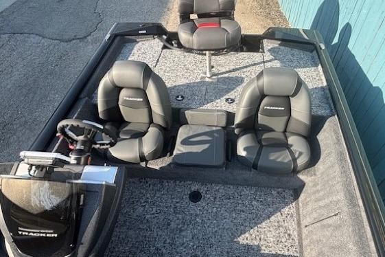 2026 Tracker Pro Team 195 boat interior with seating and steering wheel.