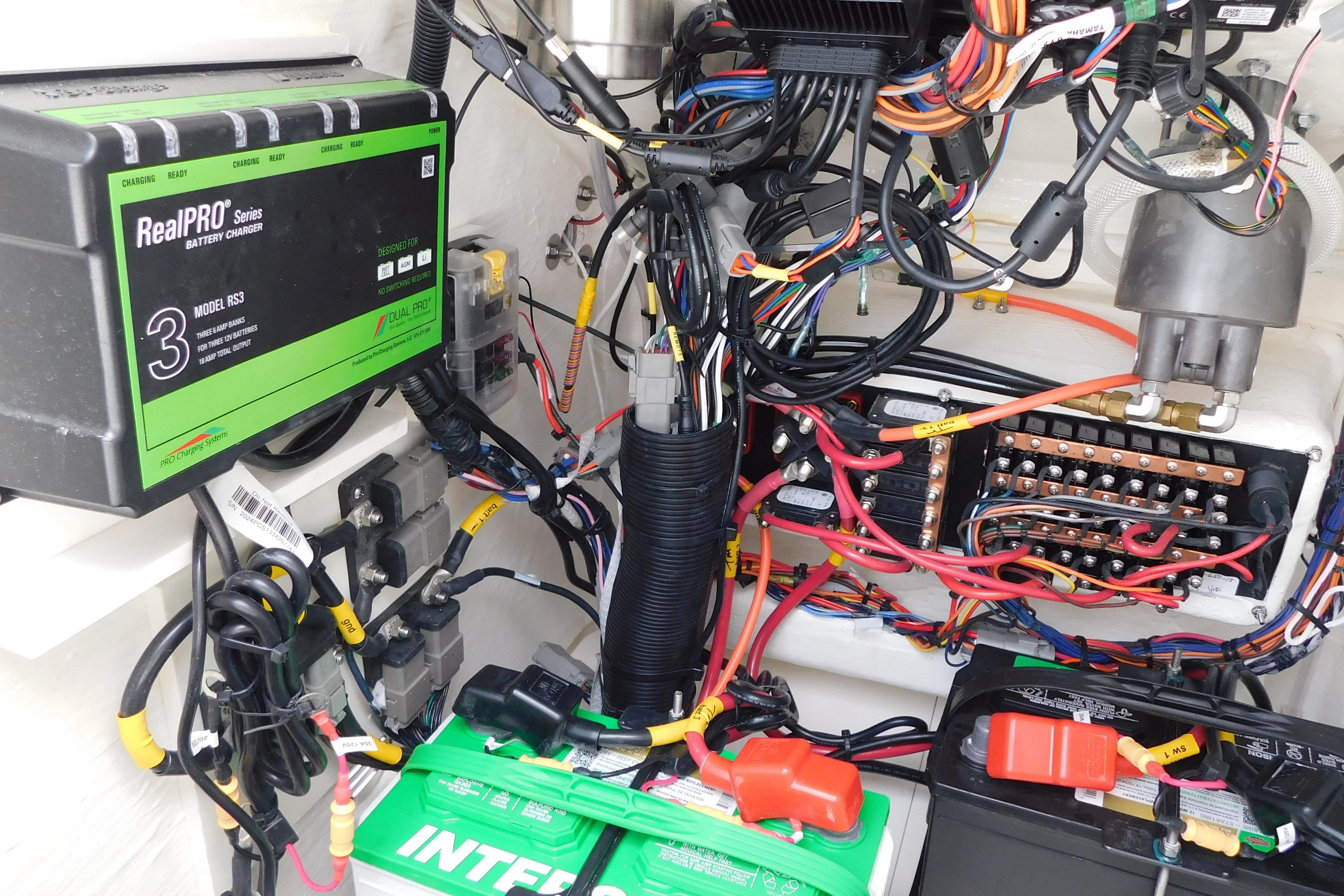 Electrical system of 2026 Pathfinder 2200 TRS with RealPRO battery charger and wiring.