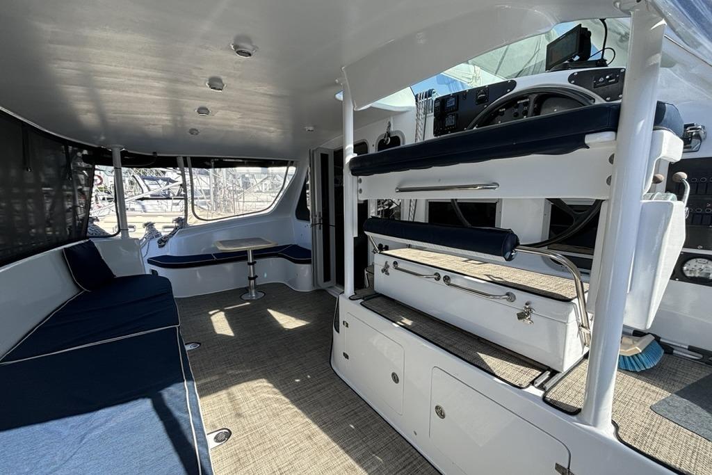 Interior of 2022 Spirited 480 Custom boat with seating and navigation area.