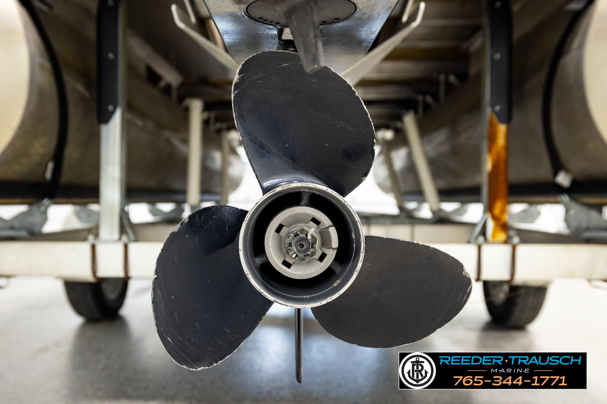 Propeller of a 2021 Bennington 20 SV pontoon boat on a trailer.