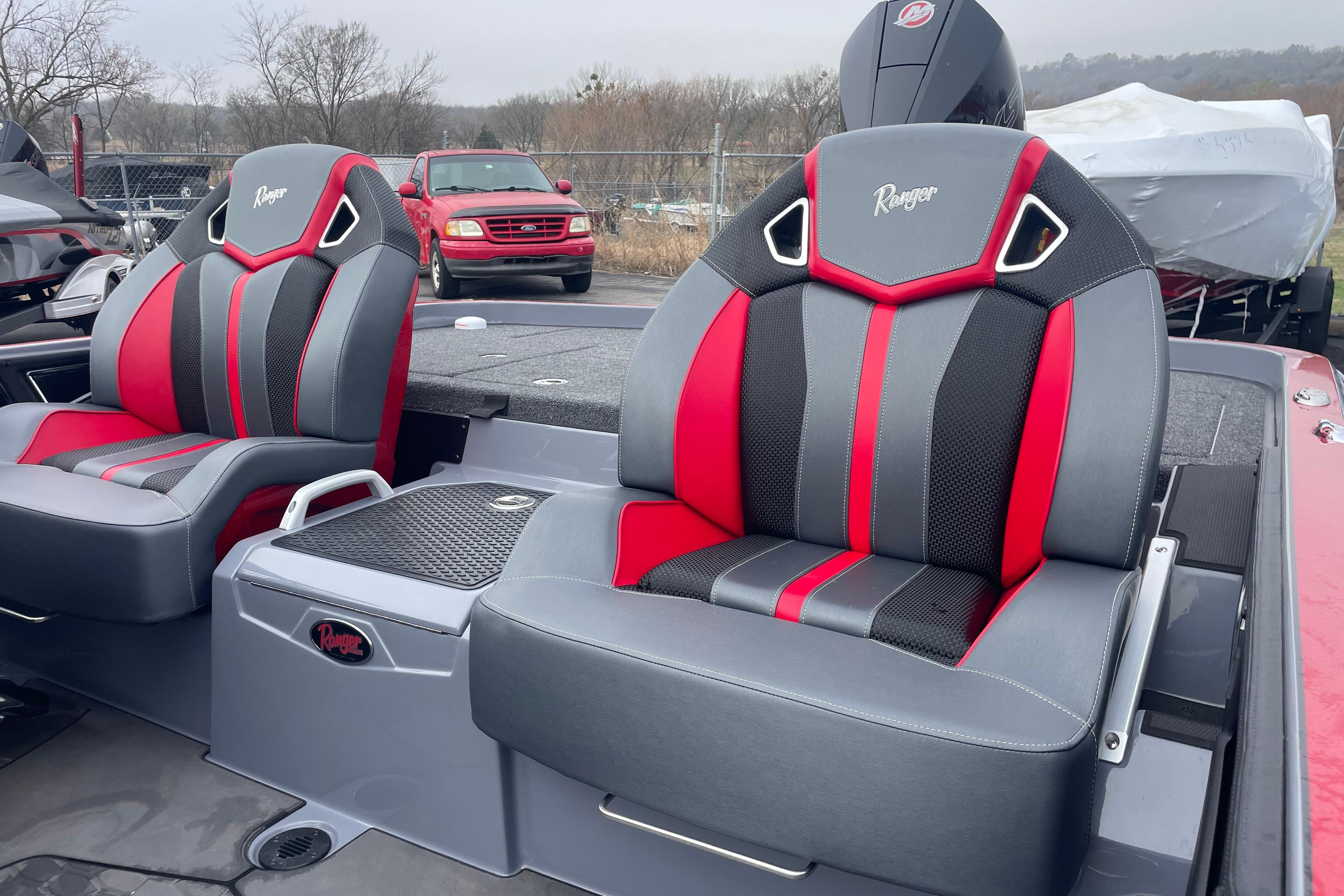 2025 Ranger Z520R Cup-Equipped boat seats with red and black accents.