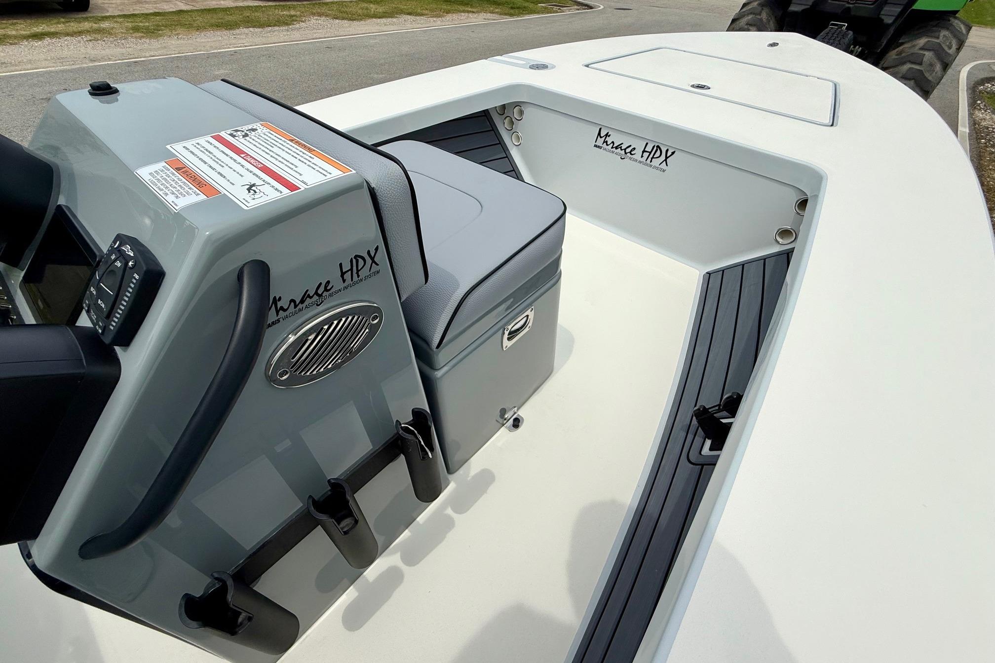 2026 Maverick 17 HPX-S boat interior with console and seating, showcasing sleek design.