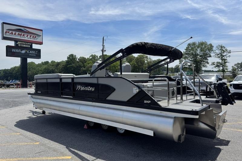 2026 Manitou Encore 25 SL SHP pontoon boat displayed at dealership.