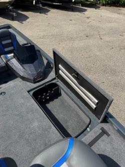 Ranger RT198P 2025 boat with open storage compartment.