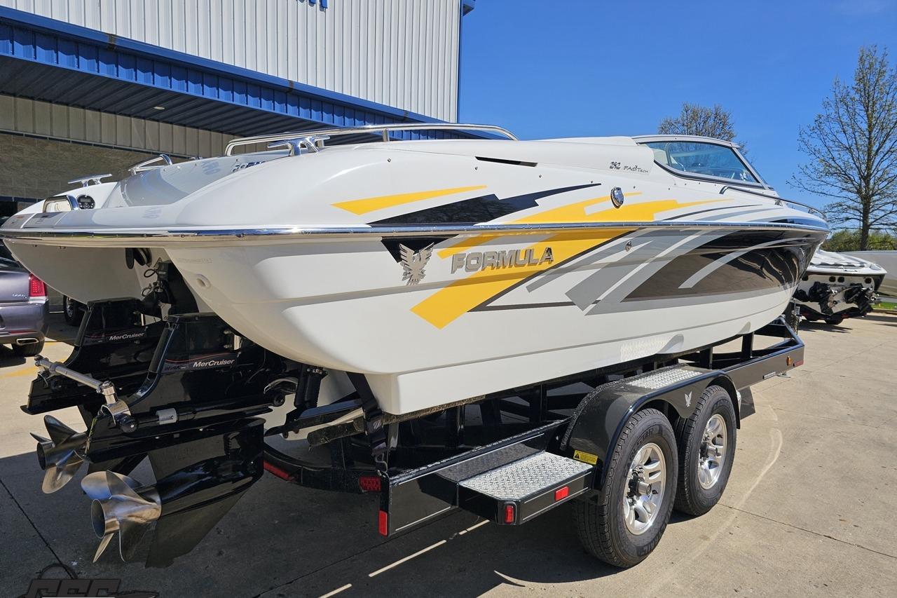 2014 Formula 292 FASTech boat on trailer, featuring sleek design and vibrant graphics.