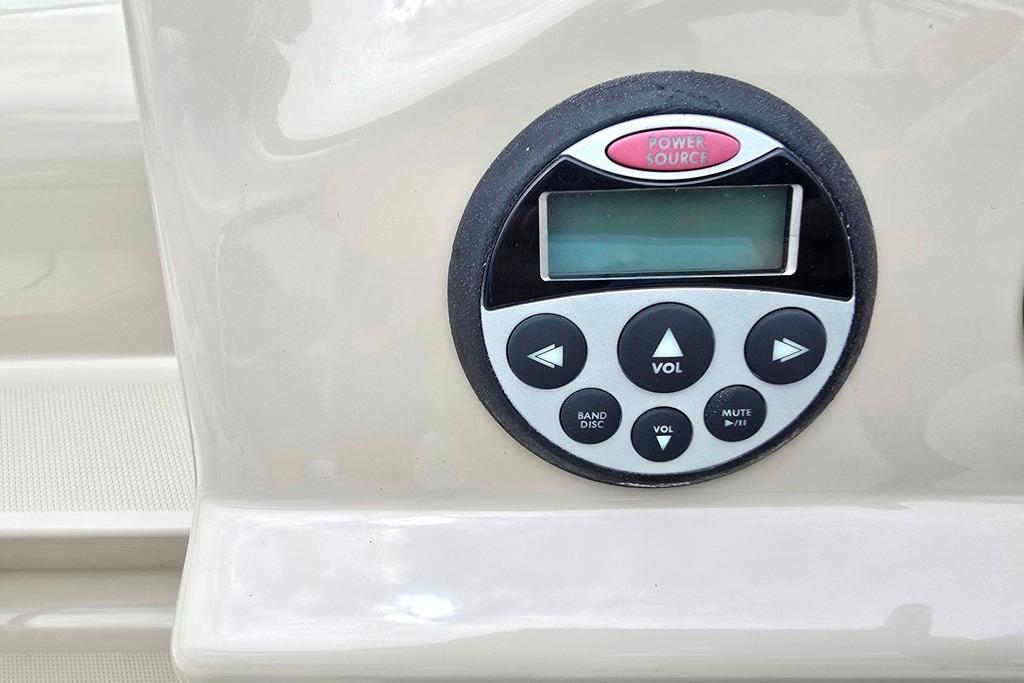 Control panel on a 2006 Sea Ray 240 Sundancer boat dashboard.