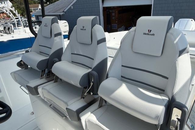 Three Wellcraft 38 T-Top 2026 boat seats in sleek, modern design.