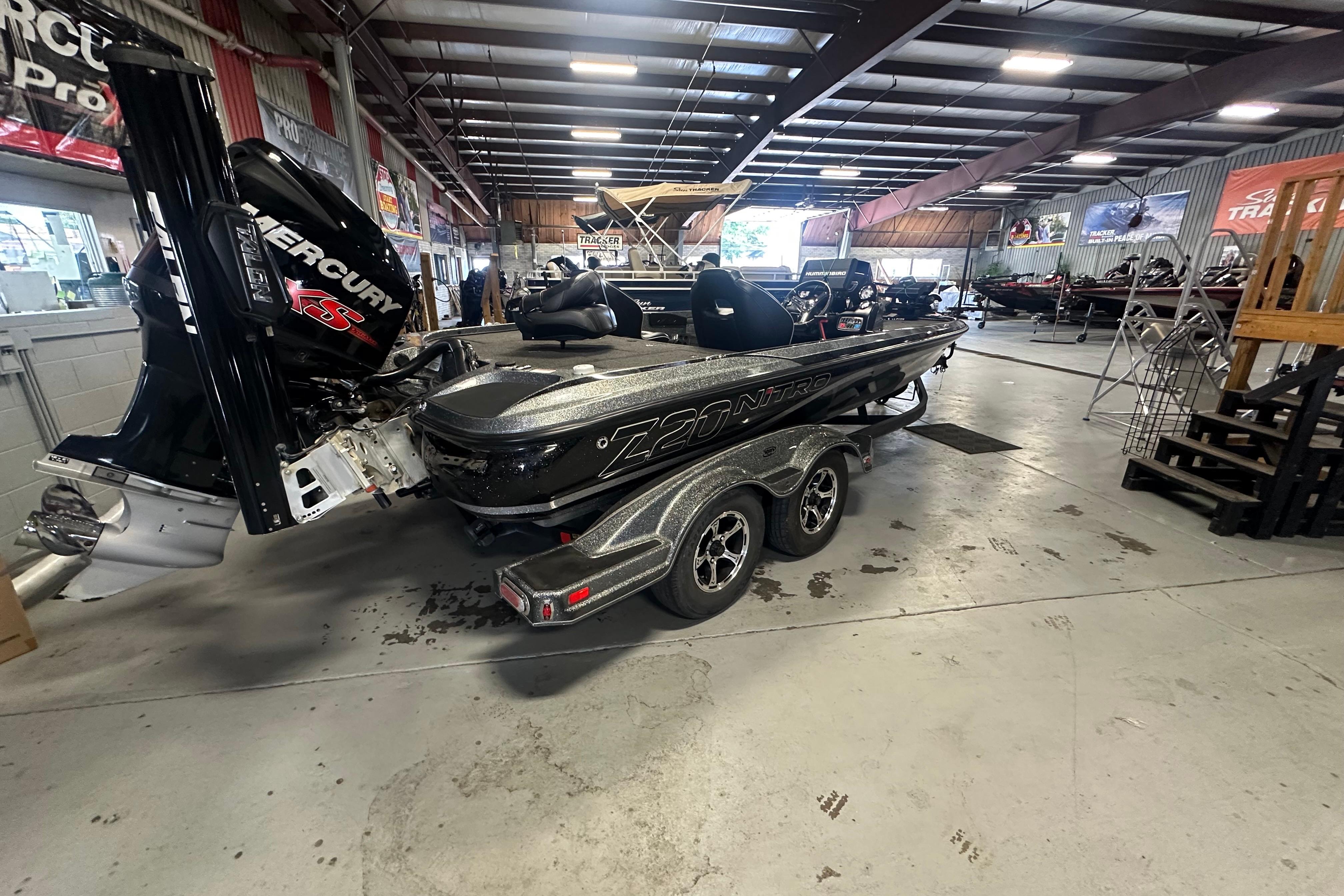 2018 Nitro Z20 Pro boat with Mercury engine in showroom.
