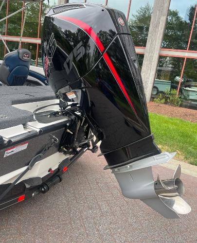 2025 Ranger 1850MS boat with powerful outboard motor, sleek black and red design.