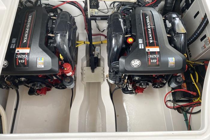 Engine compartment of 2014 Four Winns V375 with dual Volvo Penta 320 V8 engines.