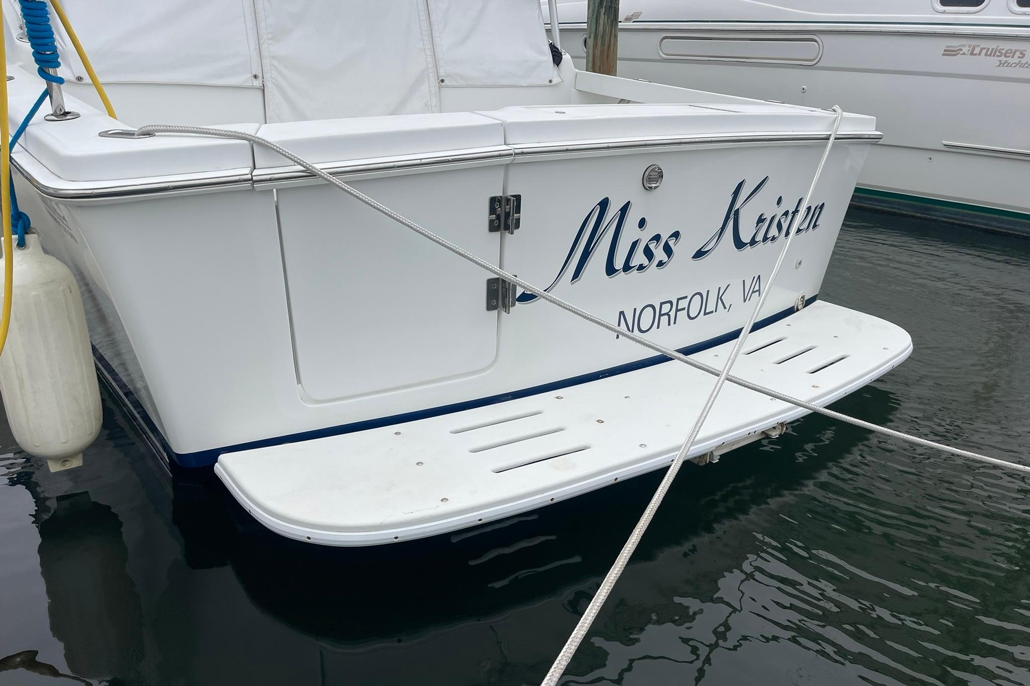 TRANSOM VIEW WITH TRANSOM WALK-THRU DOOR AND SWIM PLATFORM