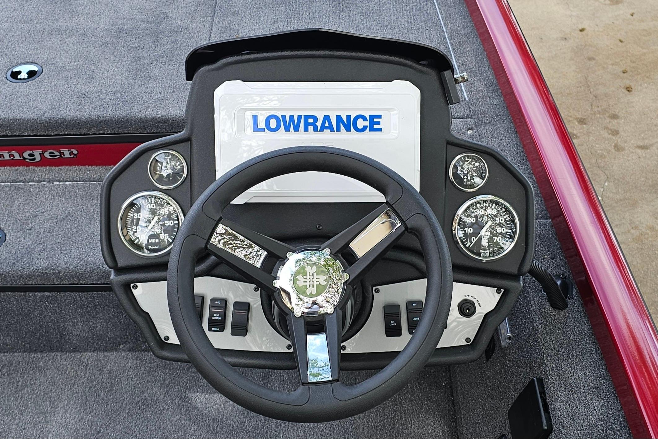 Steering console of 2026 Ranger RT178 boat with Lowrance display and gauges.