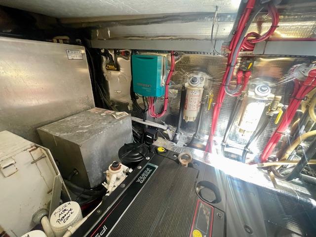 Engine room of a 2011 Regal 46 Sport Coupe with visible components and wiring.