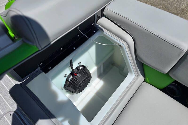 2026 Berkshire STS Arch Performance Series boat storage compartment with sleek gray seating.