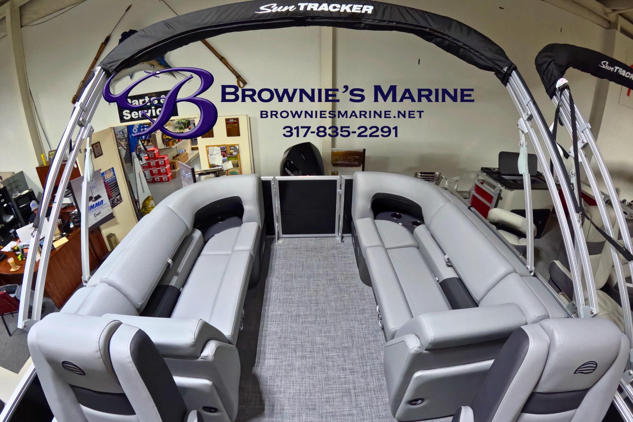 2026 Sun Tracker Party Barge 24 XP3 interior at Brownie's Marine showroom.