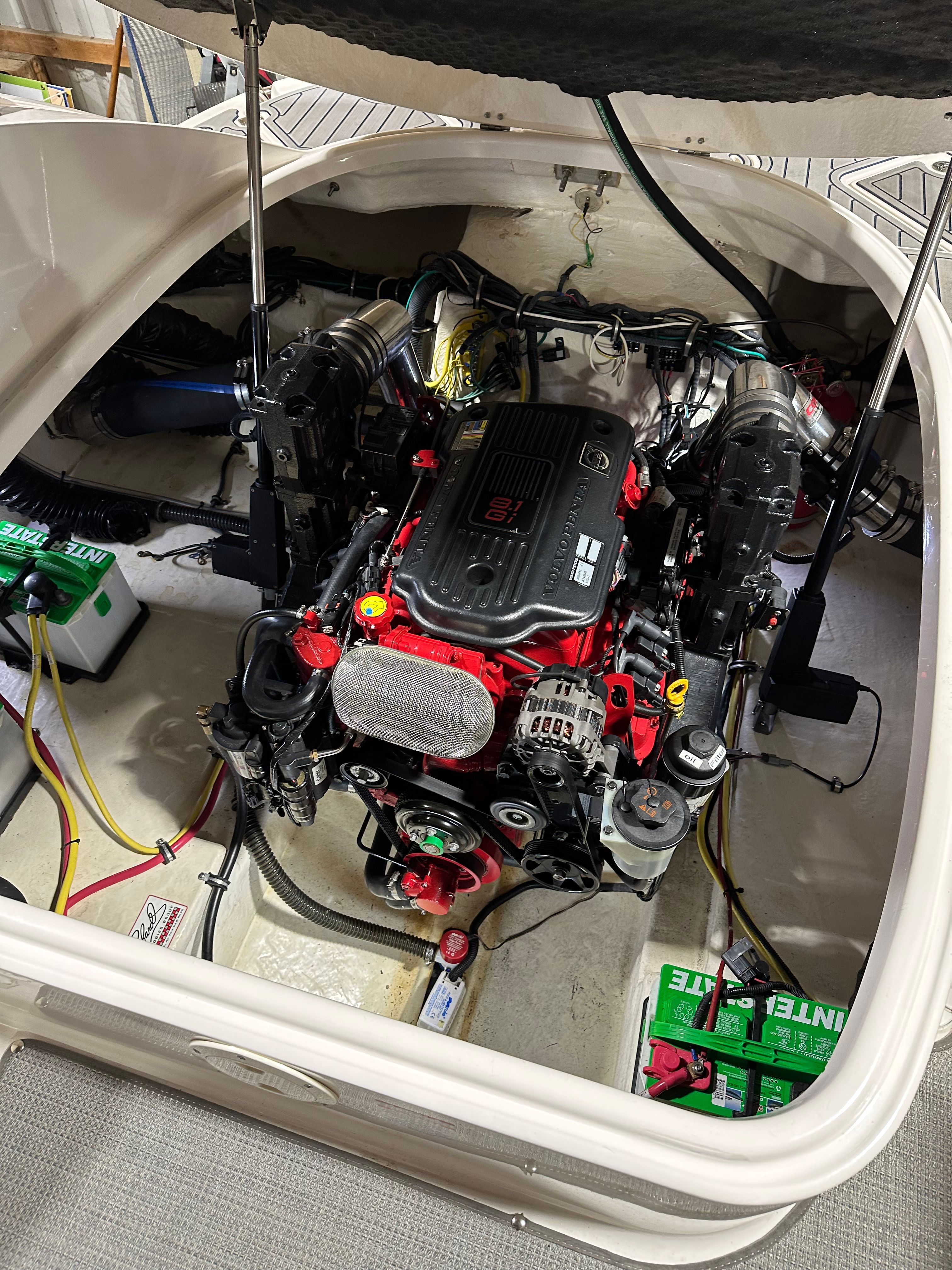 Engine compartment of a 2011 Chaparral 287 SSX with a clean engine and wiring.