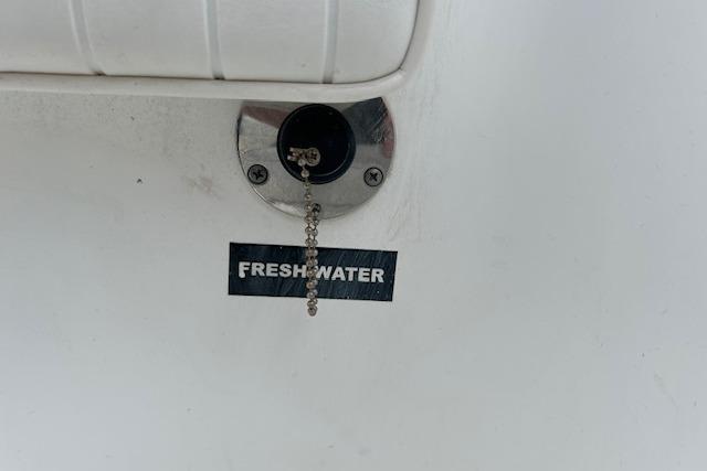 Freshwater inlet on 2005 Sea Fox 230 Walk Around boat.