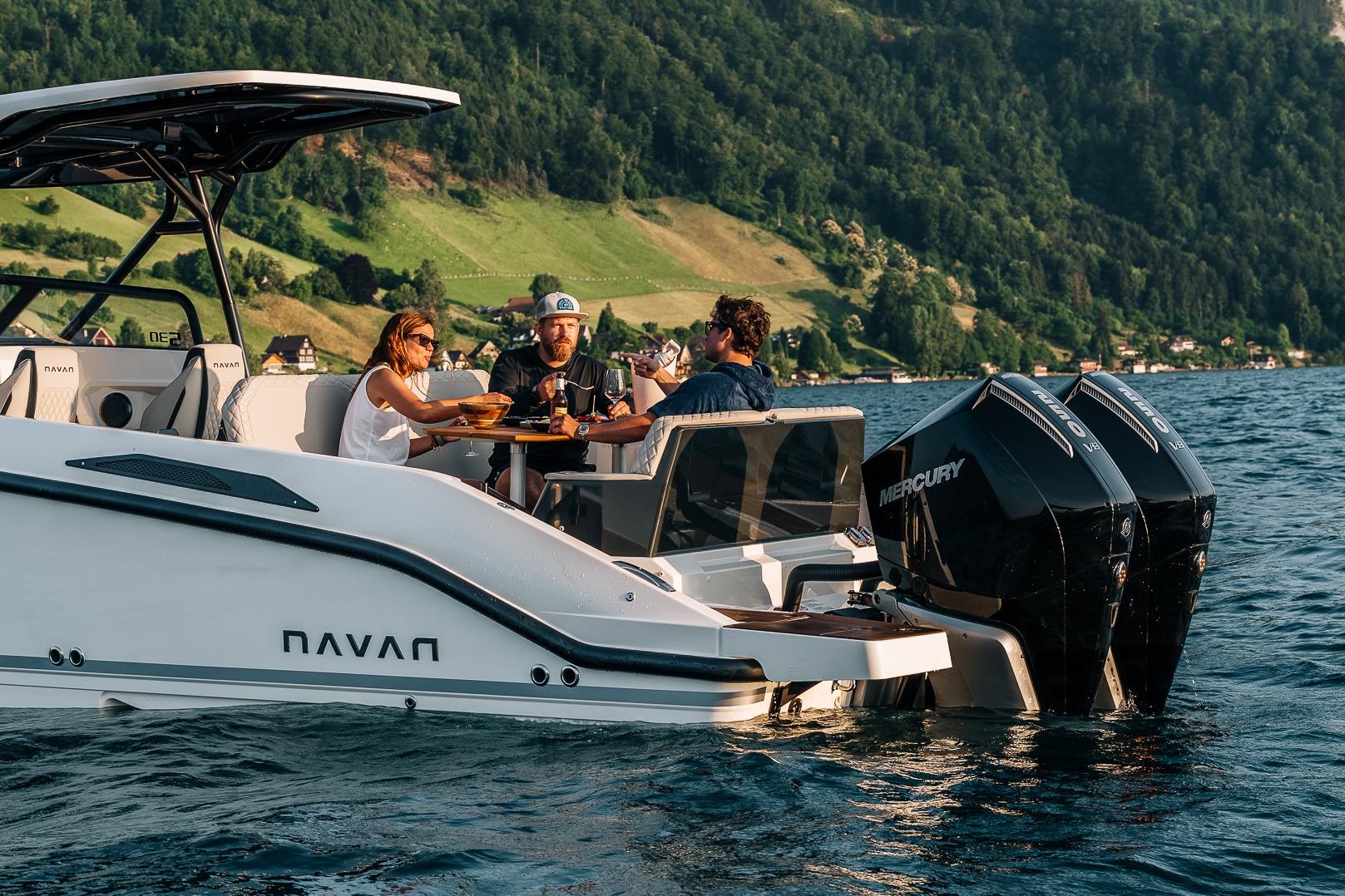 Navan S30 boat 2026 on lake with friends dining.