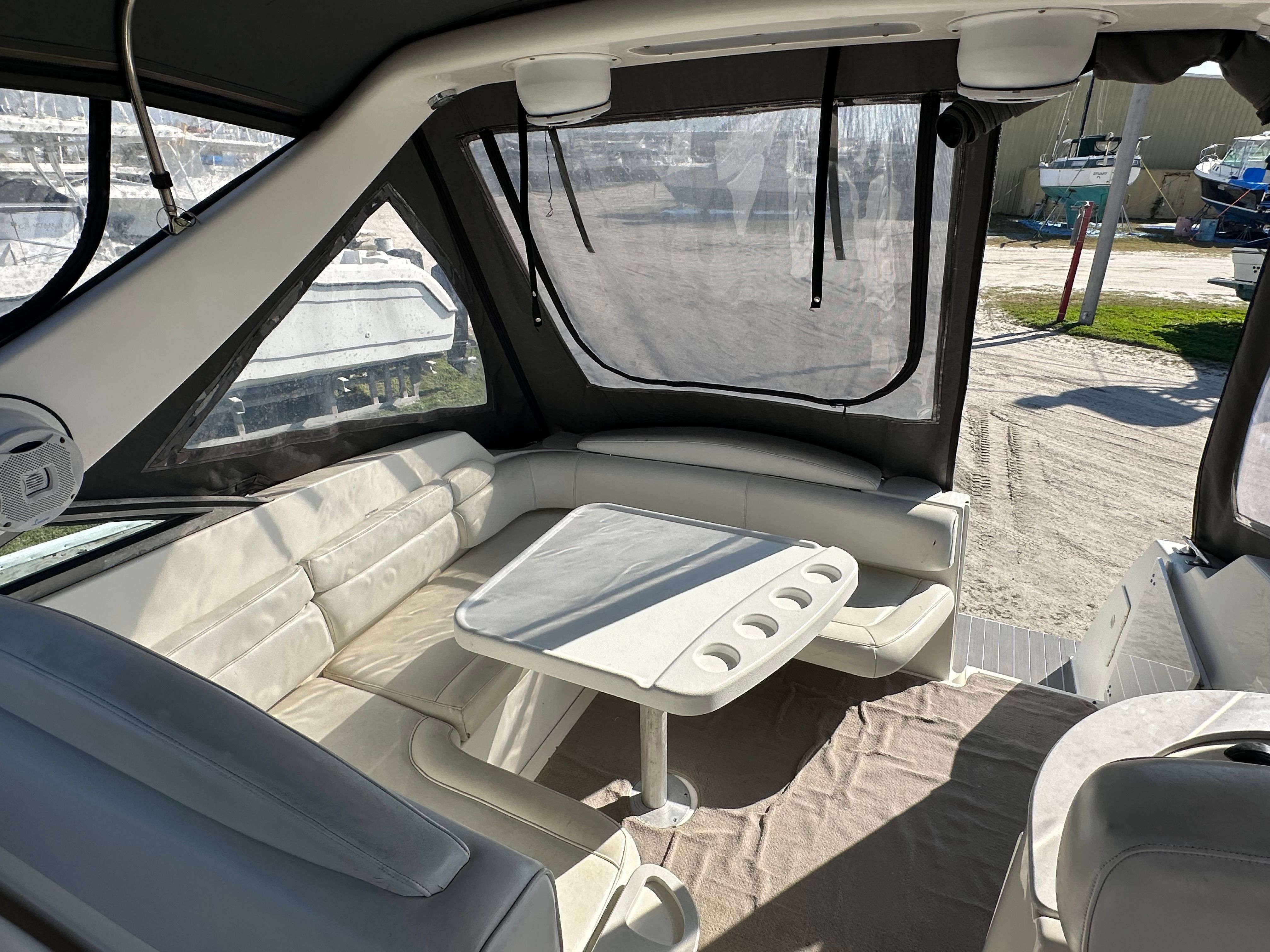 Interior of a 1999 Wellcraft 3000 Martinique yacht with seating area.
