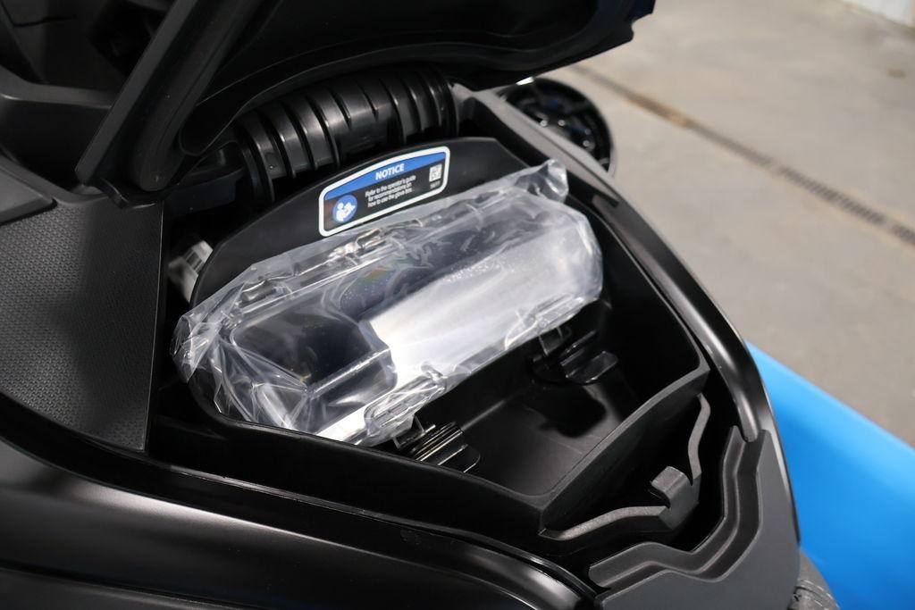 2026 Sea-Doo RXT-X 325 storage compartment with protective cover.