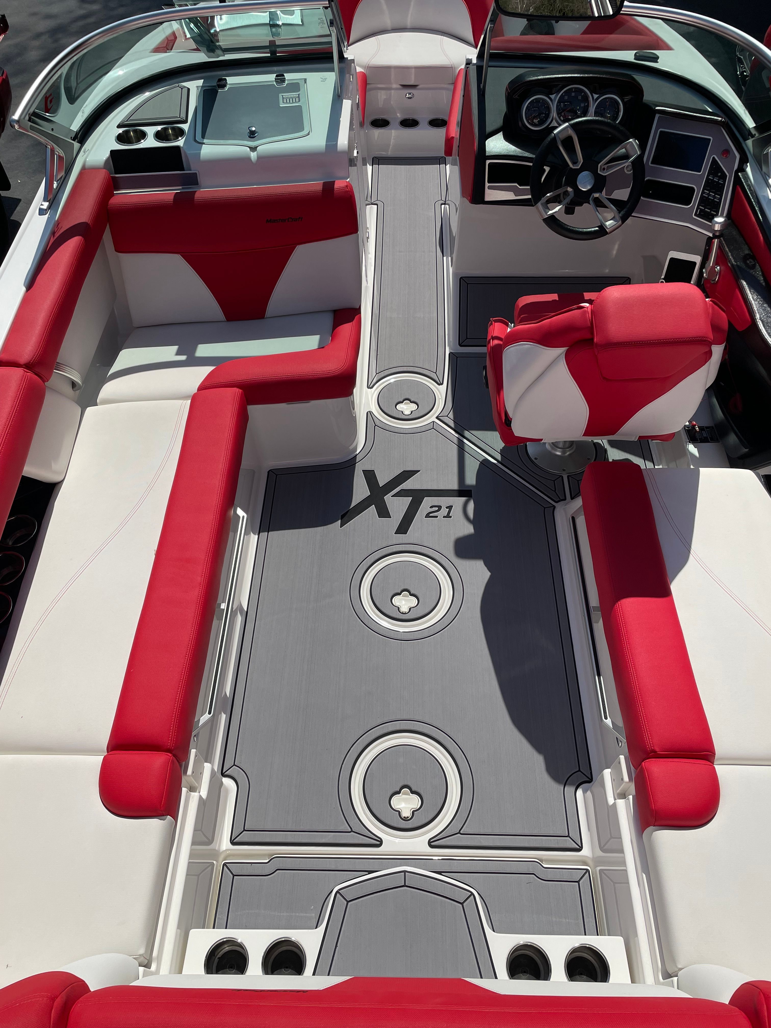 Interior of a 2019 Master XT21 boat with red seating.