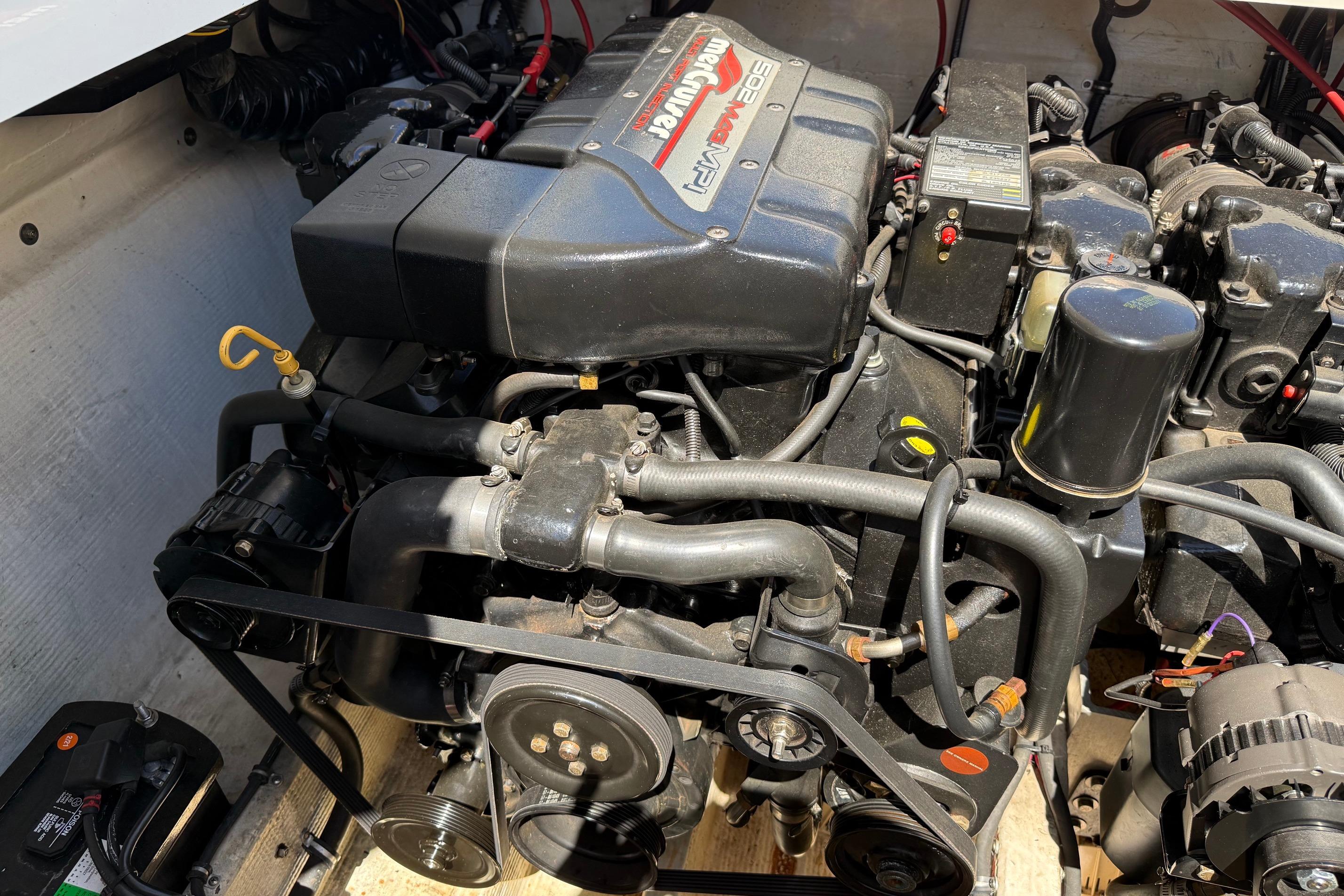 Engine of a 1998 Fountain 35 Lightning boat, showcasing detailed mechanical components.