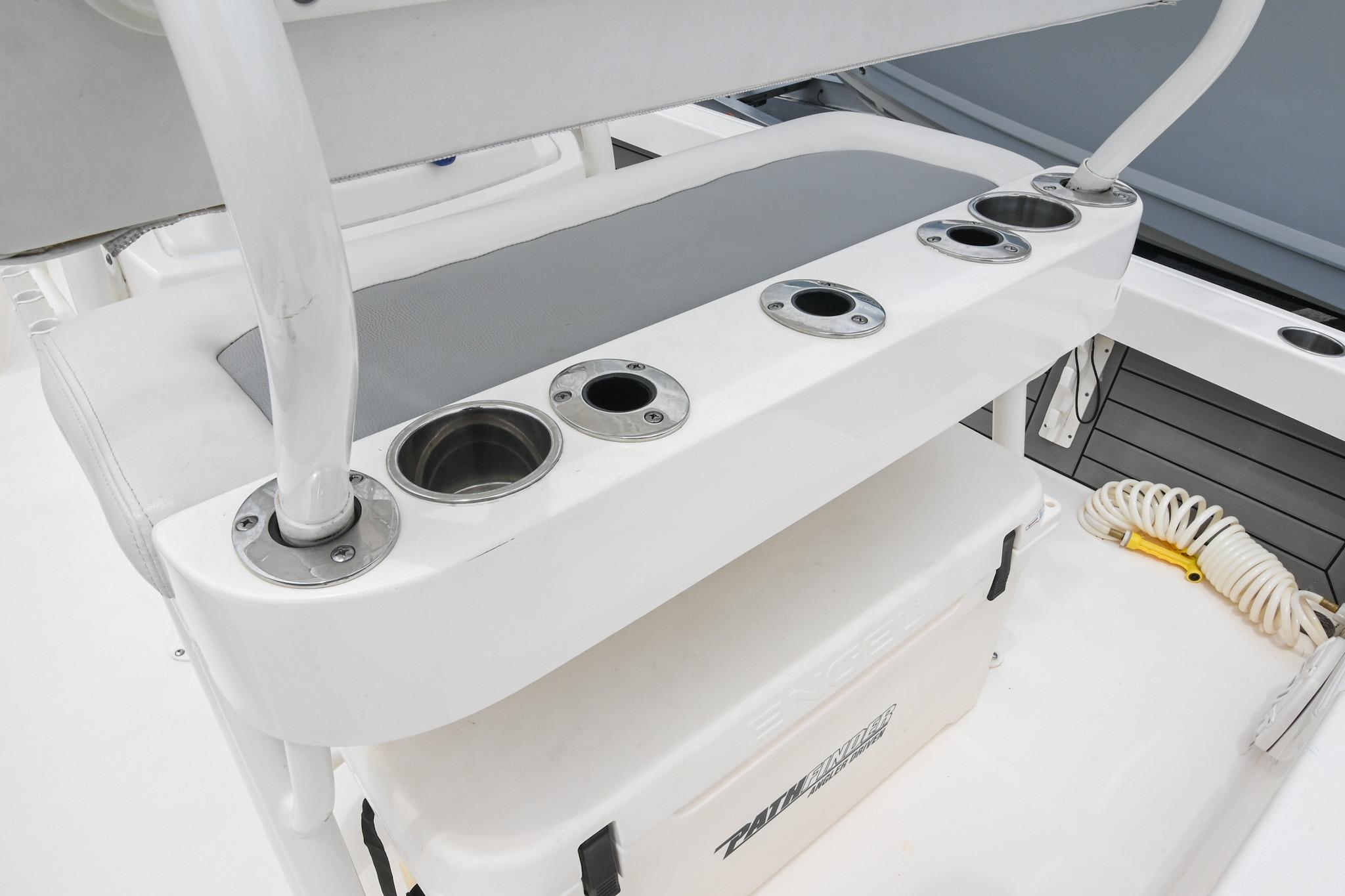 2021 Pathfinder 2200 TRS boat seating with integrated cup holders and storage.