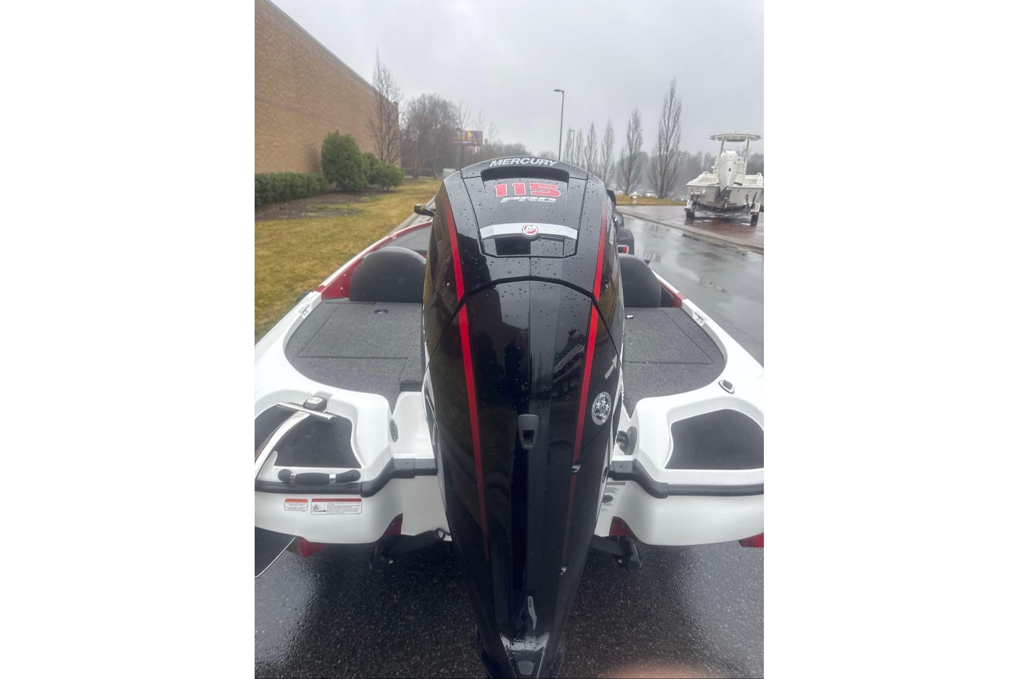 2026 Nitro Z17 boat with Mercury 115 engine on a rainy day.