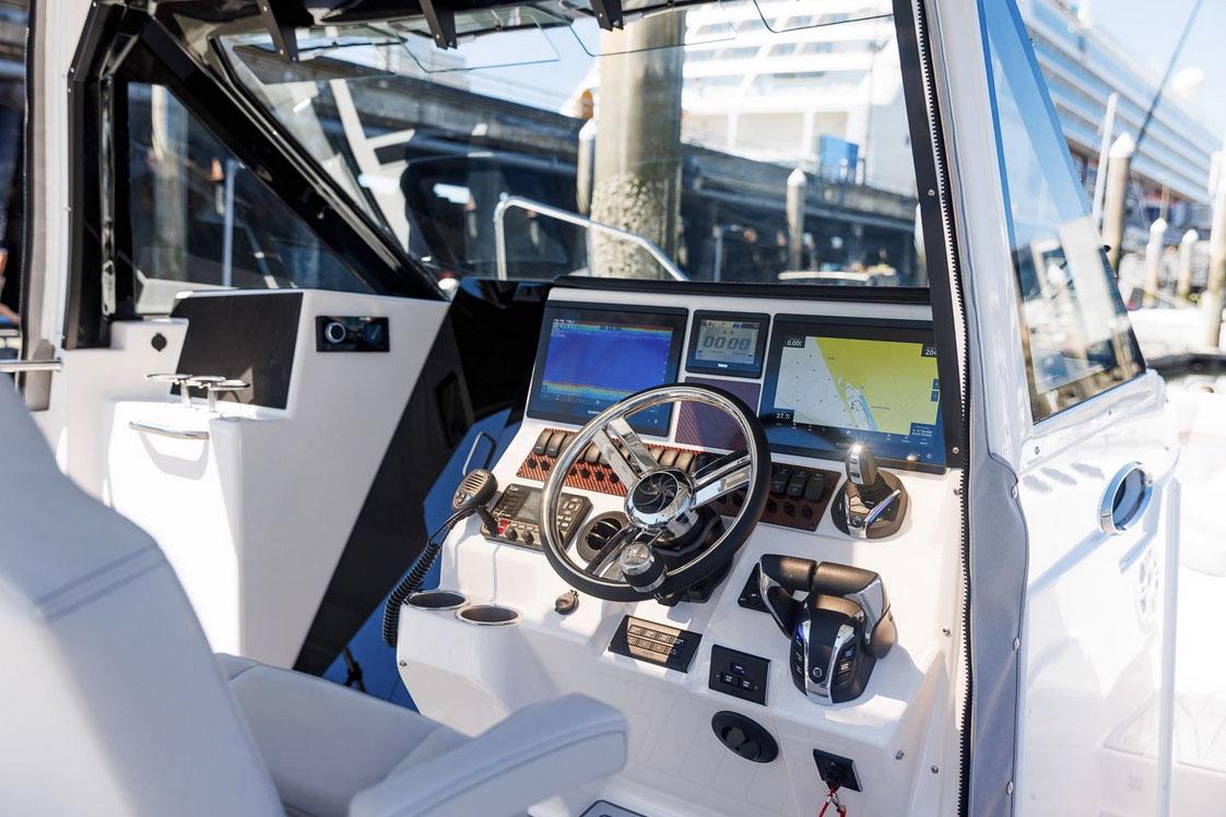 Manufacturer Provided Image: 2025 Solara S-310 CW boat cockpit with advanced navigation and control systems.
