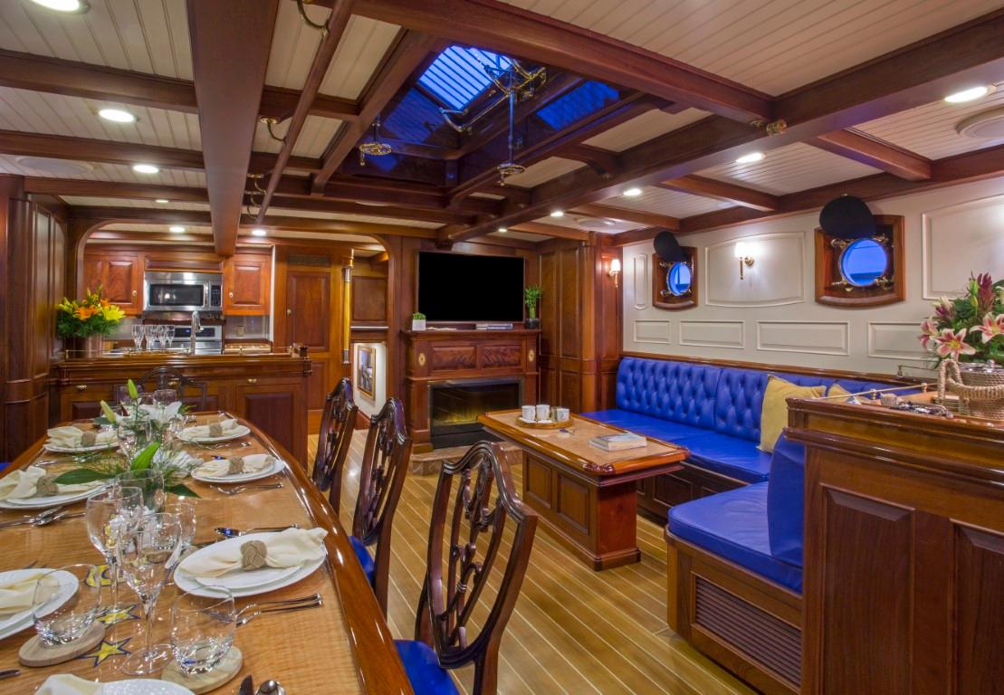 Luxurious interior of 2014 Eastern Shipbuilding Schooner with elegant dining and seating area.