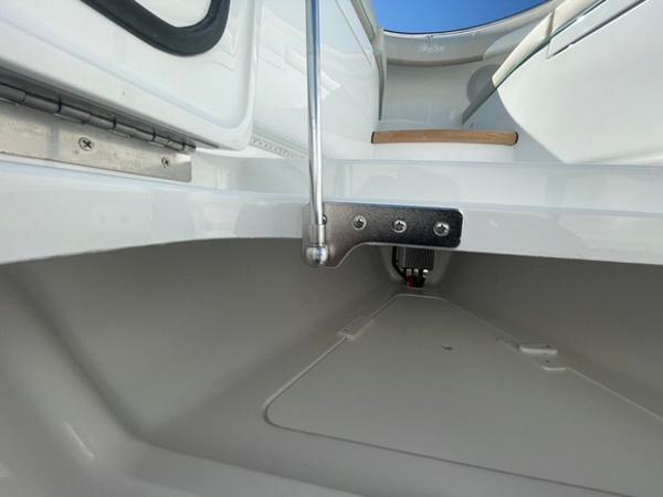 2025 Mag Bay 43 Center Console boat interior detail showing clean, white surfaces and stainless steel hardware.