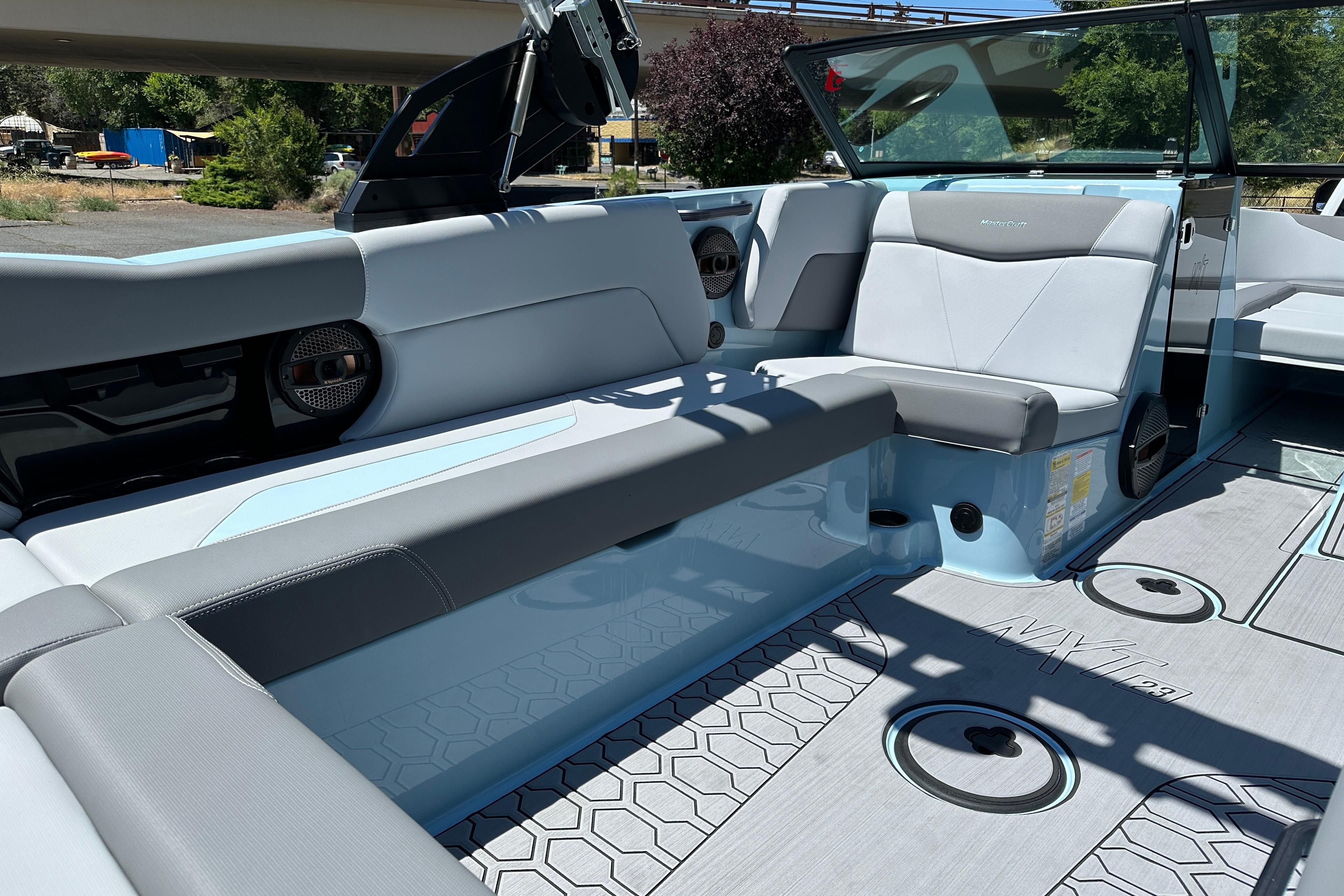 2023 MasterCraft NXT23 boat interior with sleek seating and modern design.