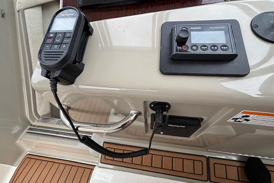 Control panel of a 2011 Sea Ray 370 Sundancer boat with marine electronics.