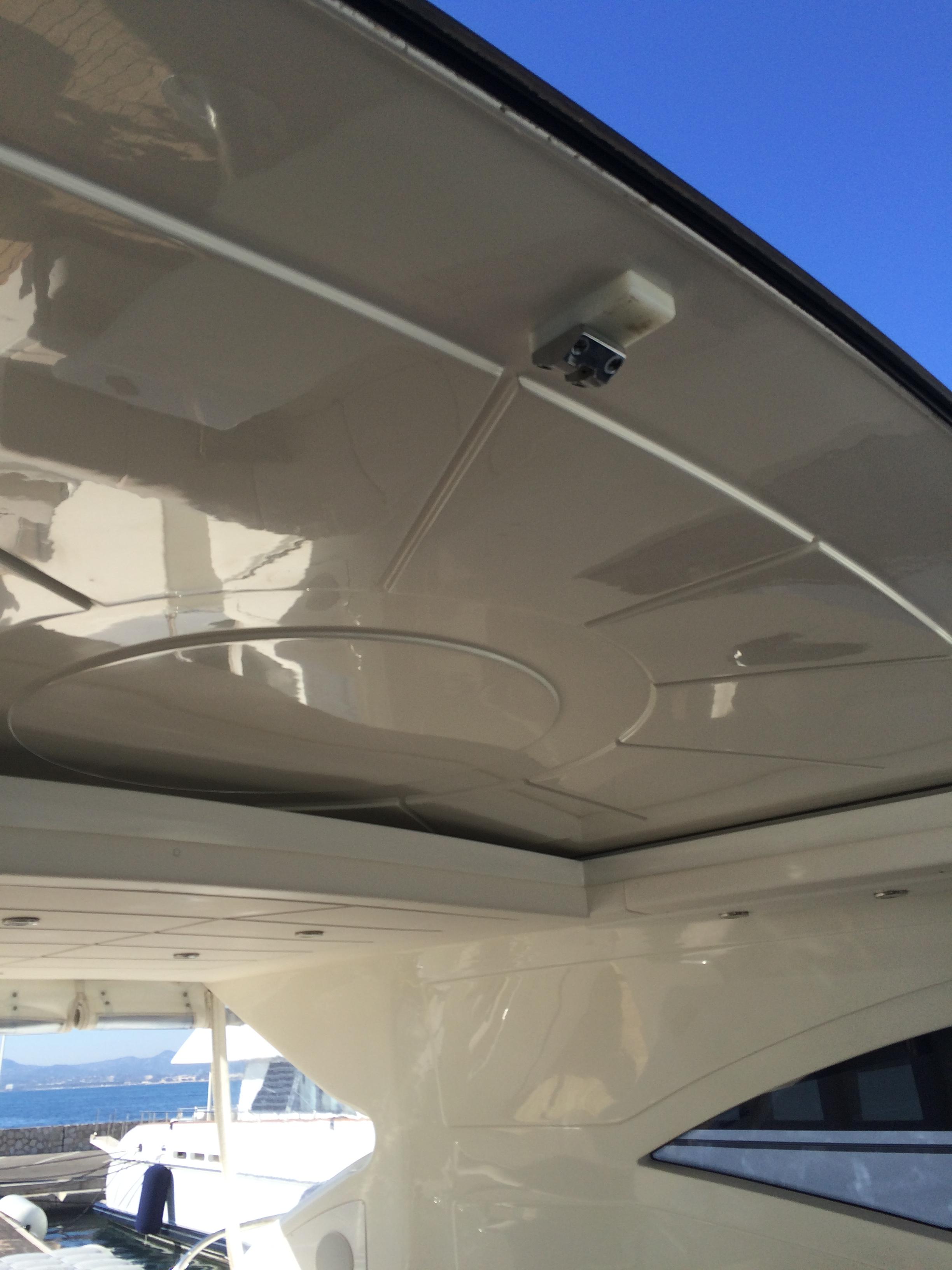 2002 Mangusta 72 yacht ceiling with sleek design and ocean view.