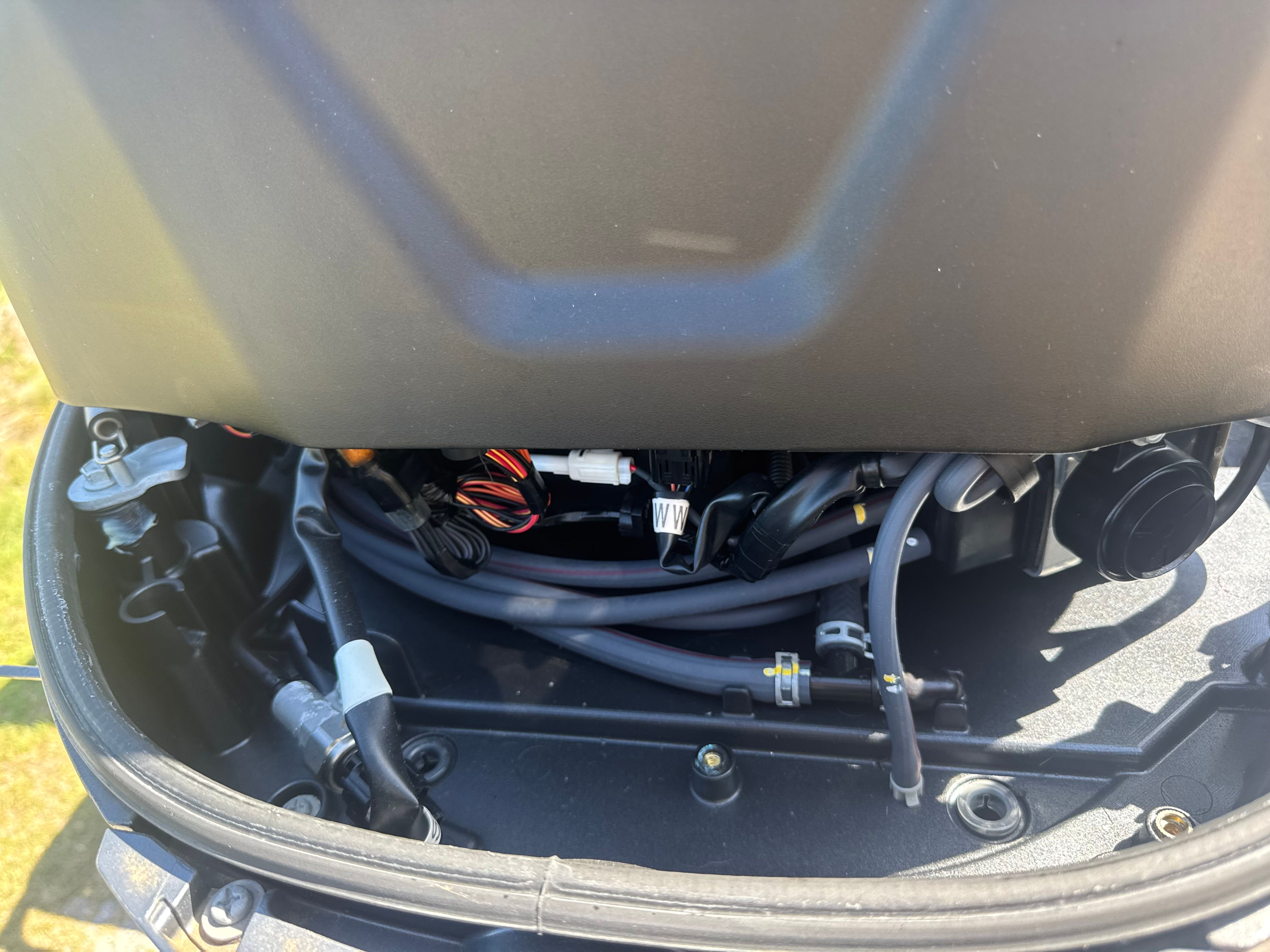 Close-up of a 1997 Parker 2520 boat engine compartment.
