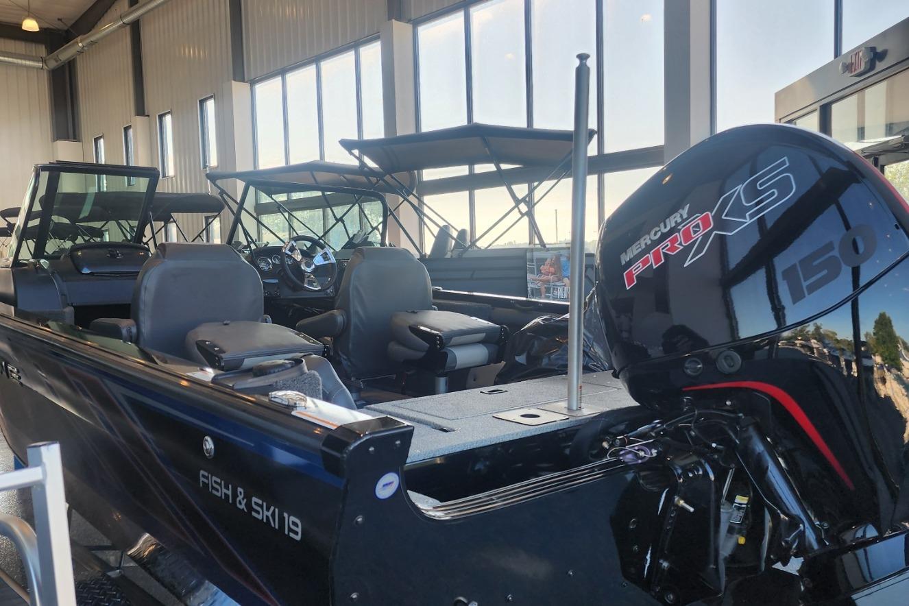 2023 Lowe Fish & Ski 19 boat with Mercury Pro XS 150 engine in showroom.