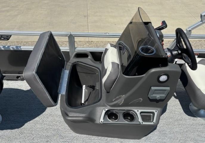 2026 Sun Tracker Bass Buggy 18 DLX console with storage compartment and steering wheel.
