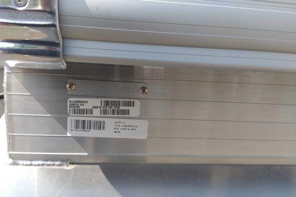 2026 Sun Tracker Bass Buggy 18 DLX identification plate with barcodes and serial numbers.