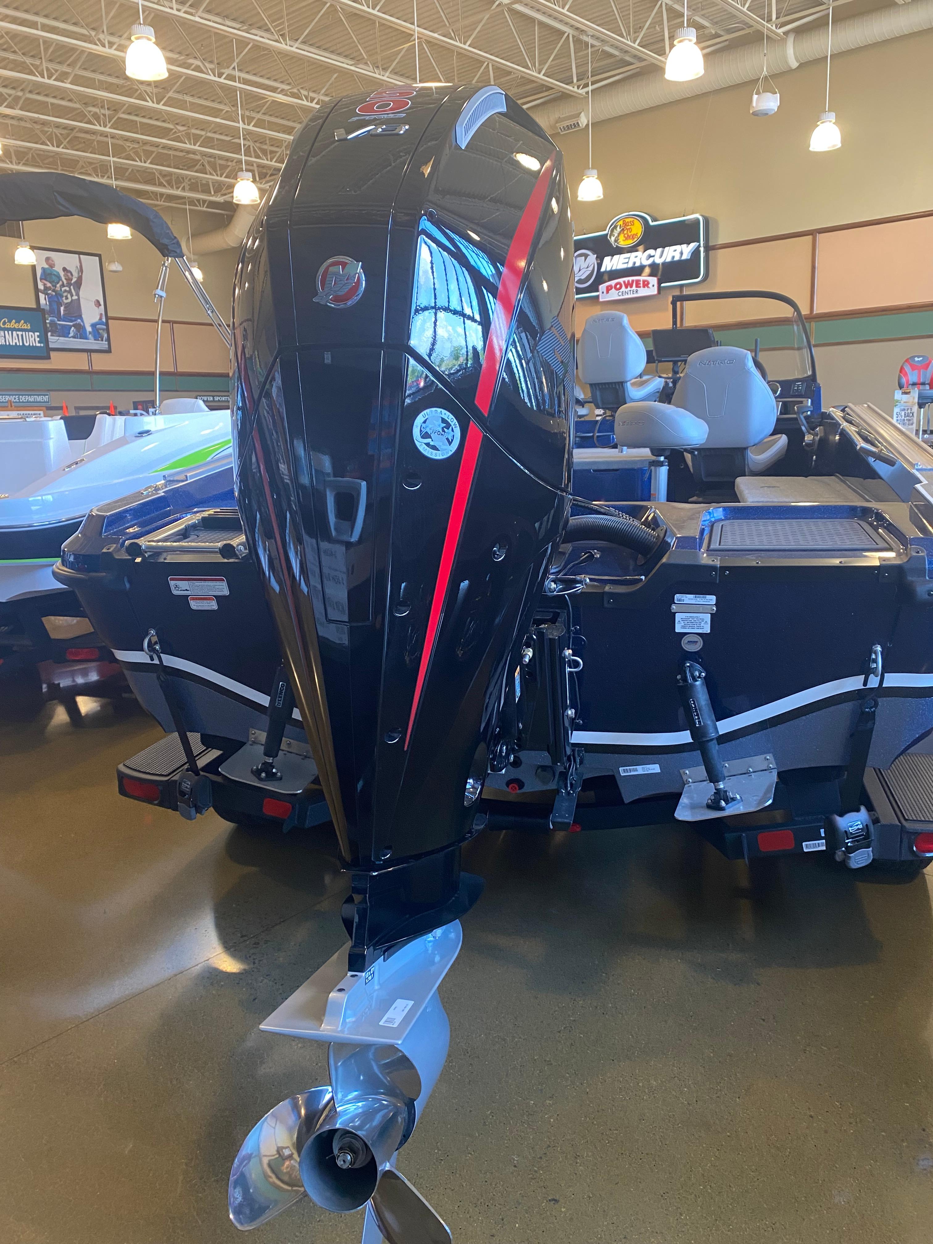 2025 Nitro ZV20 Pro boat with powerful Mercury outboard motor in showroom.