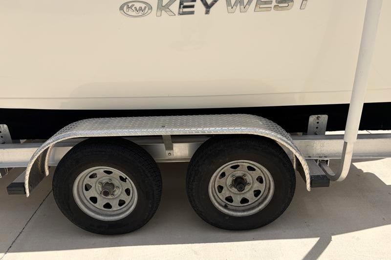 Trailer with dual wheels for 2023 Key West 203 FS boat.