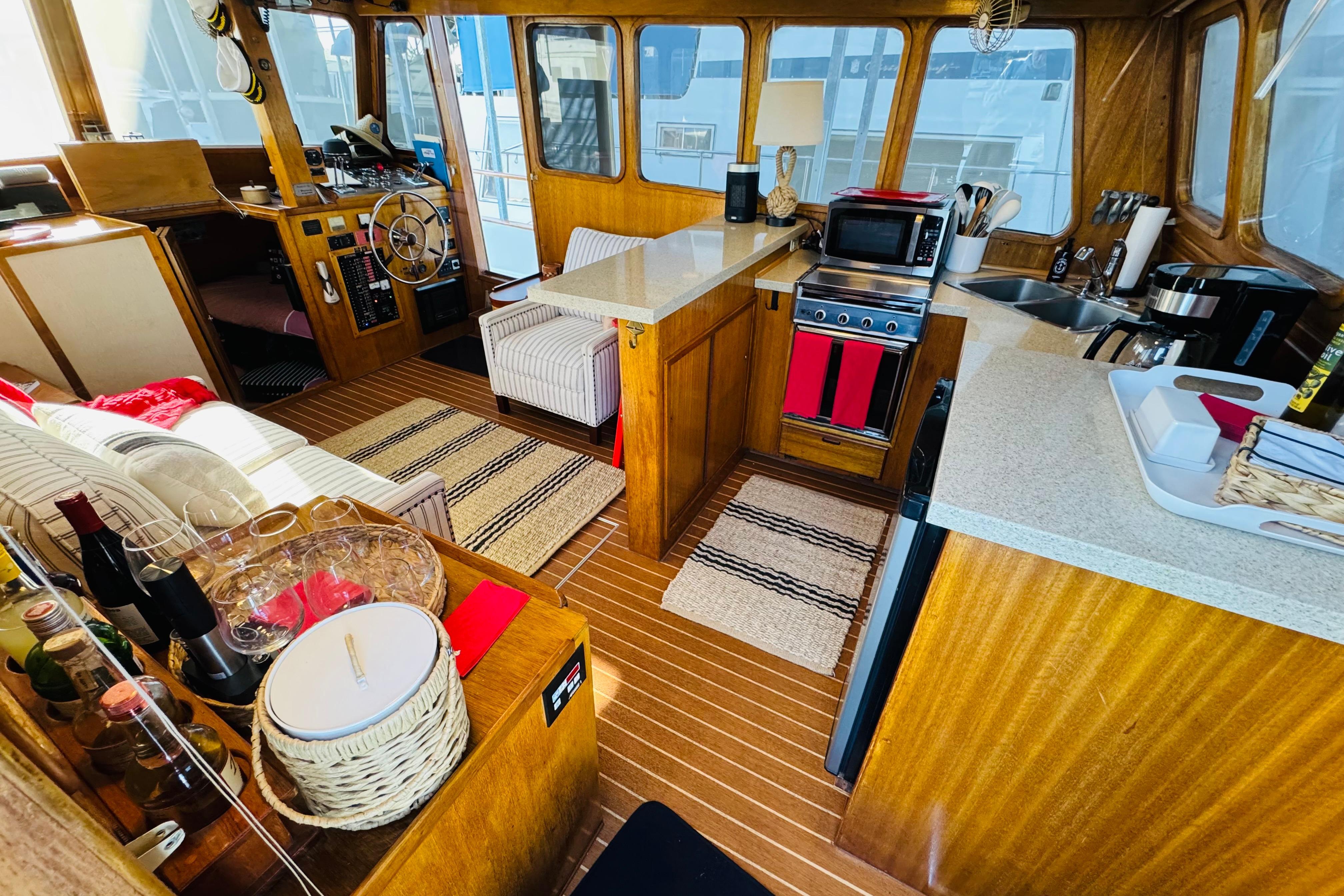1978 Californian 42 LRC yacht interior with wood finish, kitchen, and seating area.