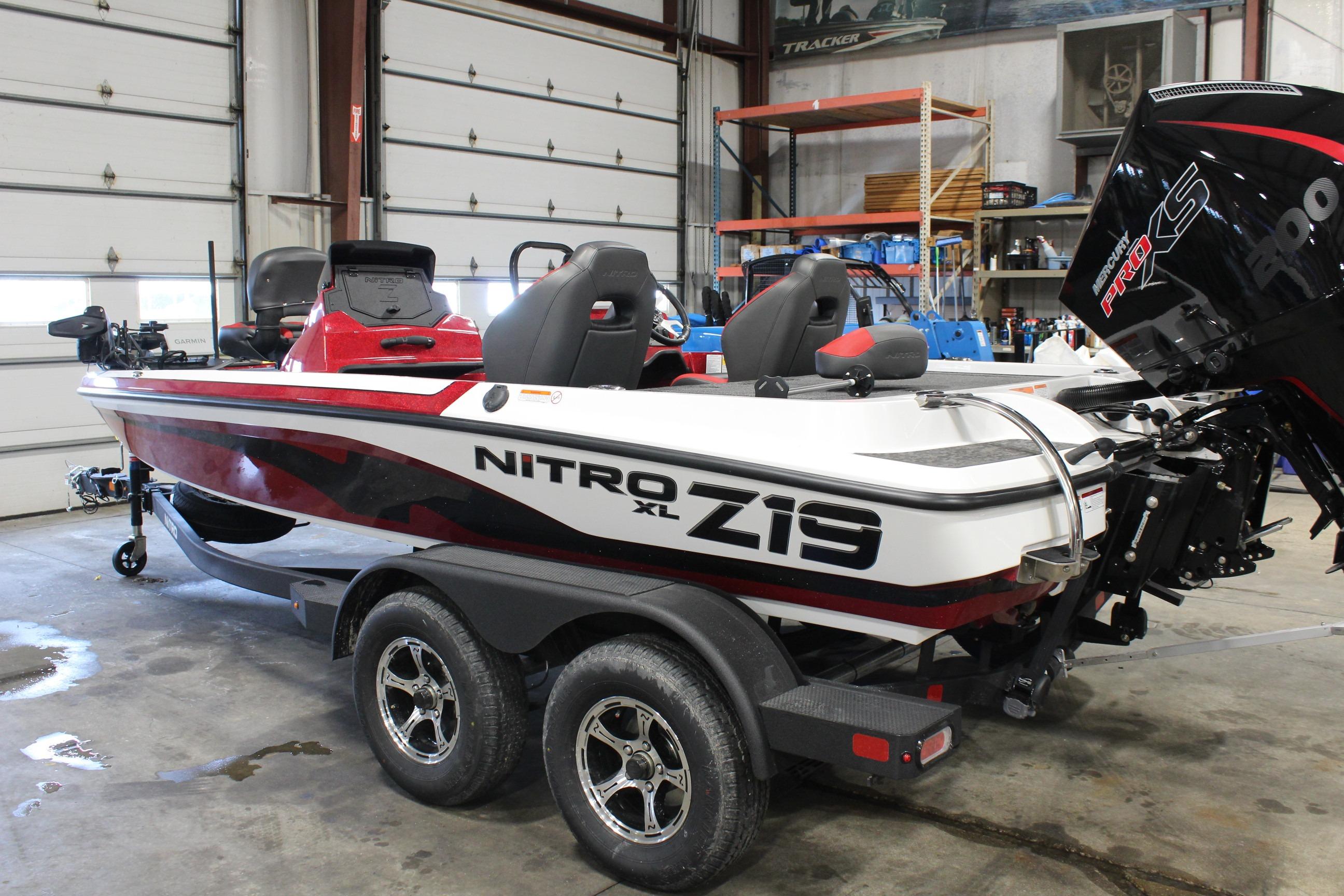 2026 Nitro Z19 XL Pro boat in a garage, featuring sleek design and powerful engine.