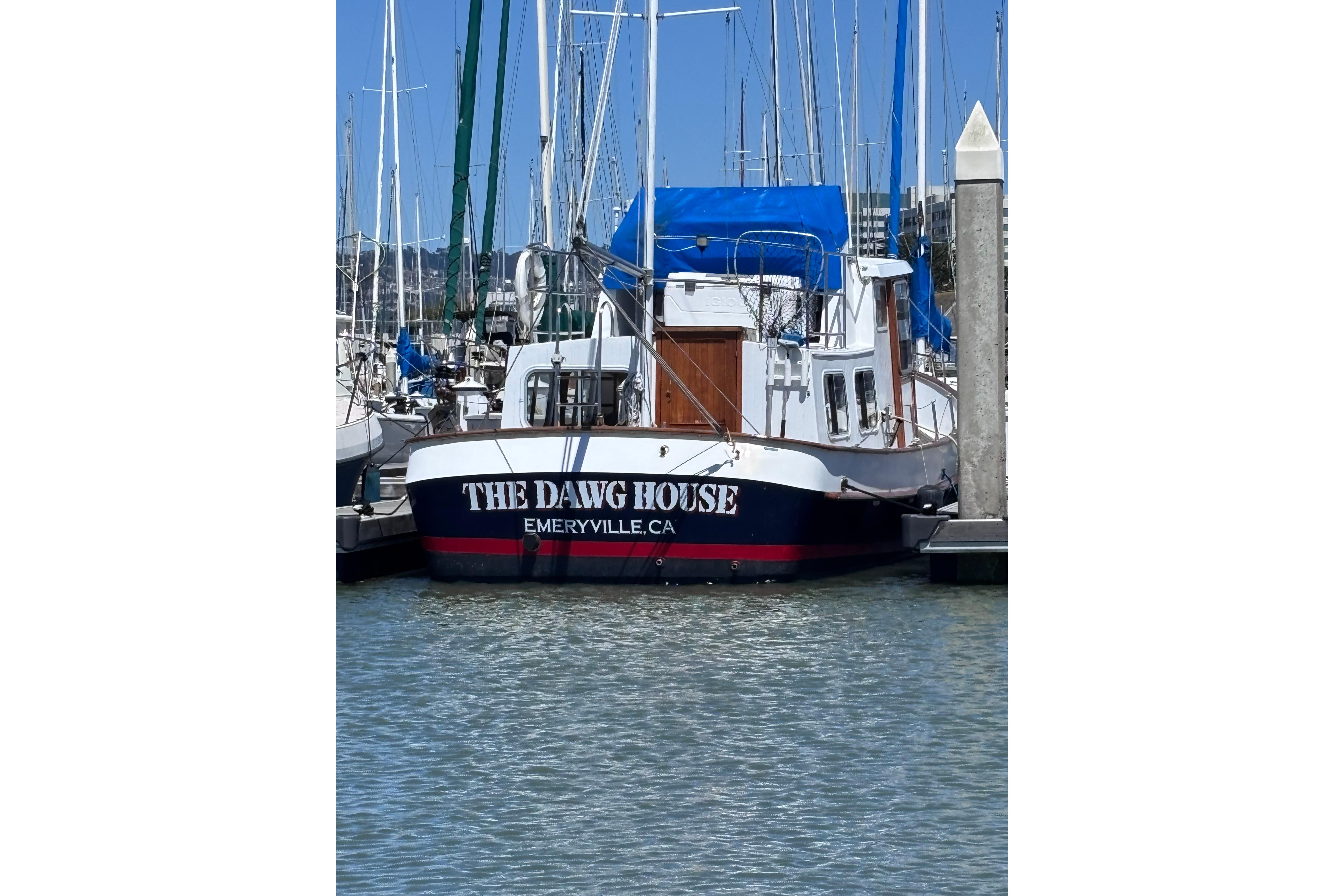 1985 Transpacific Marine Pacific Eagle 32 boat named "The Dawg House" docked in Emeryville, CA.