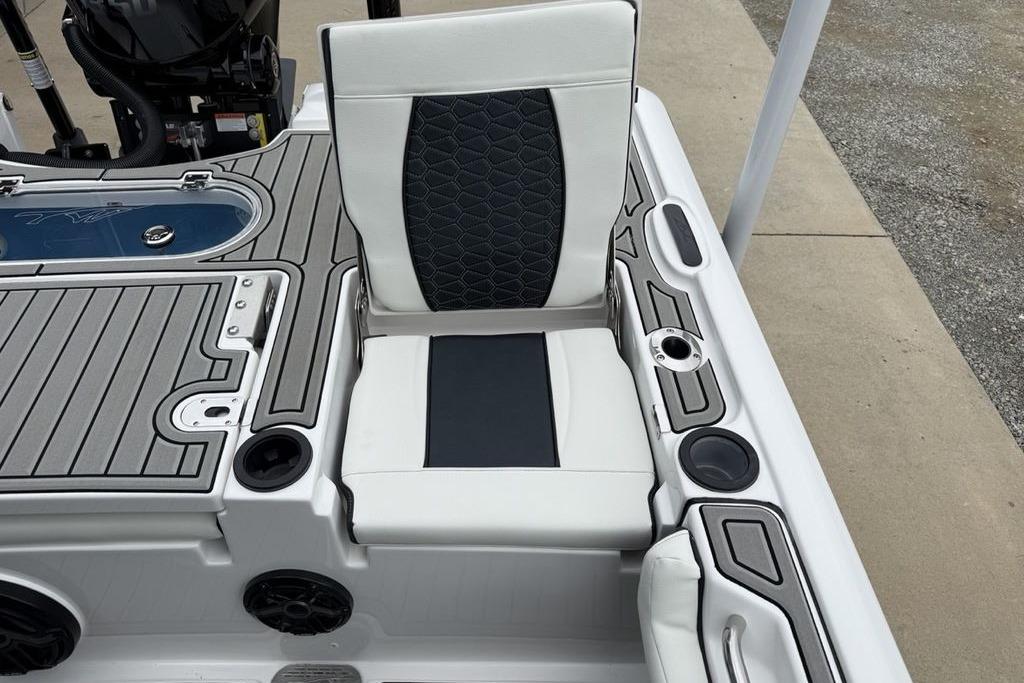 2026 Tidewater 2500 Carolina Bay boat interior with cushioned seating and deck details.